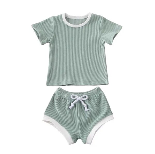 Lounge Set - Blue Introducing our Baby Lounge 2 Piece Set, the perfect addition to your little one's wardrobe! Made from soft and breathable 95% cotton and 5% spandex, this set is designed to keep your baby comfortable and cool all day long.