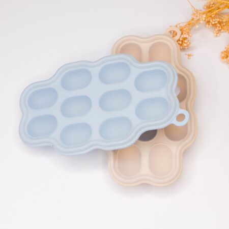 Silicone Frozen Food Tray - 10 Compartments Preparing food for you little ones made easy with our silicone food trays. These 10 compartment moulds make the perfect portion. Simply fill the moulds and pop it in the freezer of fridge. Sizing pairs perfectly with our silicone feeders. Made from food grade silicone
